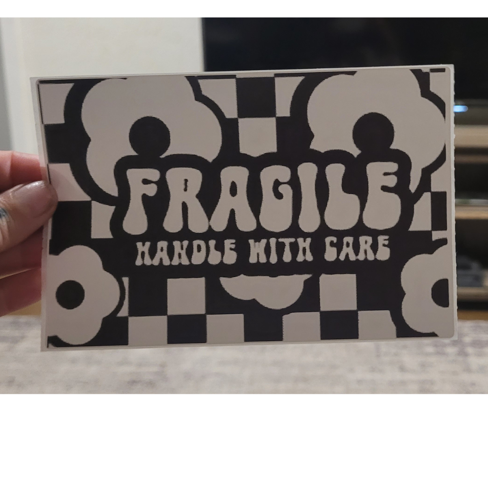 FRAGILE HANDLE WITH CARE